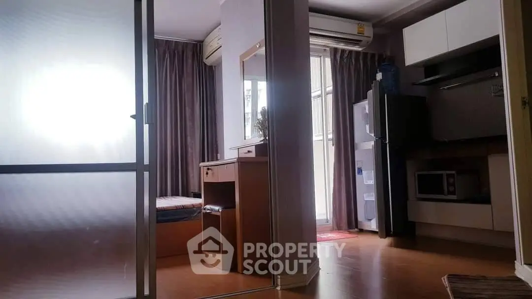 Cozy studio apartment with modern kitchen and natural light