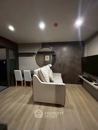 Modern living room with stylish decor and cozy seating area