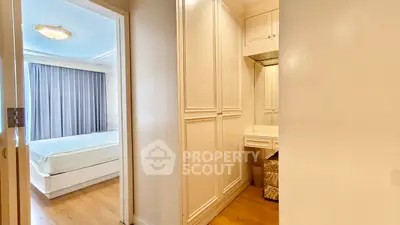 Spacious bedroom with elegant built-in wardrobe and cozy ambiance