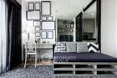 Modern living room with stylish decor and cozy seating area, perfect for relaxation and entertaining.