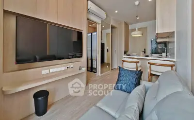 Modern living room with open kitchen and stylish decor