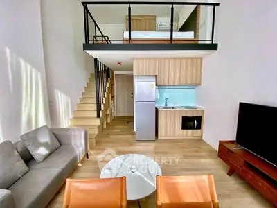 Modern loft apartment with stylish living area and mezzanine bedroom