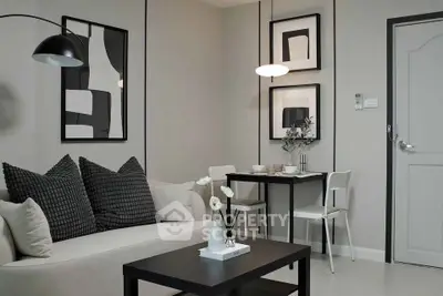 Modern living room with stylish decor and cozy dining area, perfect for urban living.