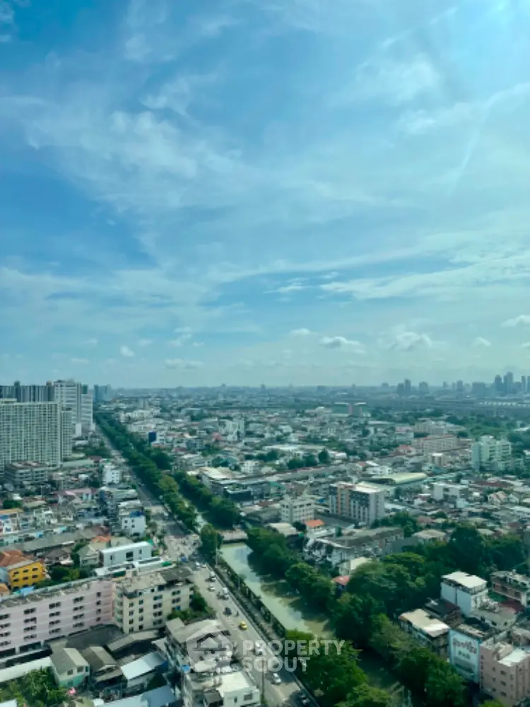 Stunning cityscape view from high-rise building showcasing urban living and skyline.
