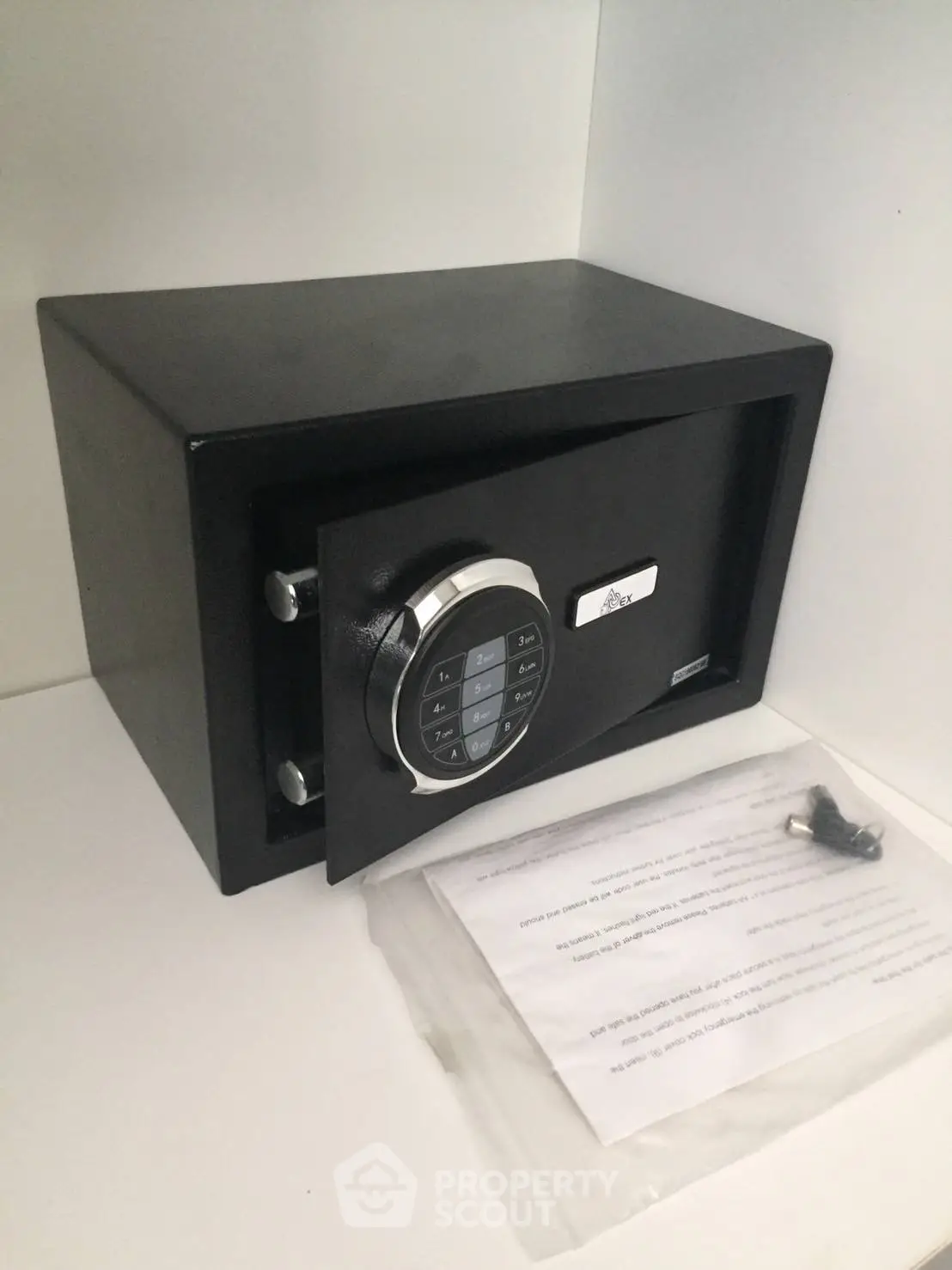 Secure black electronic safe in a modern home setting