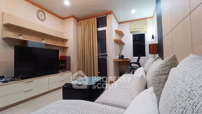 Modern living room with sleek furniture and cozy ambiance