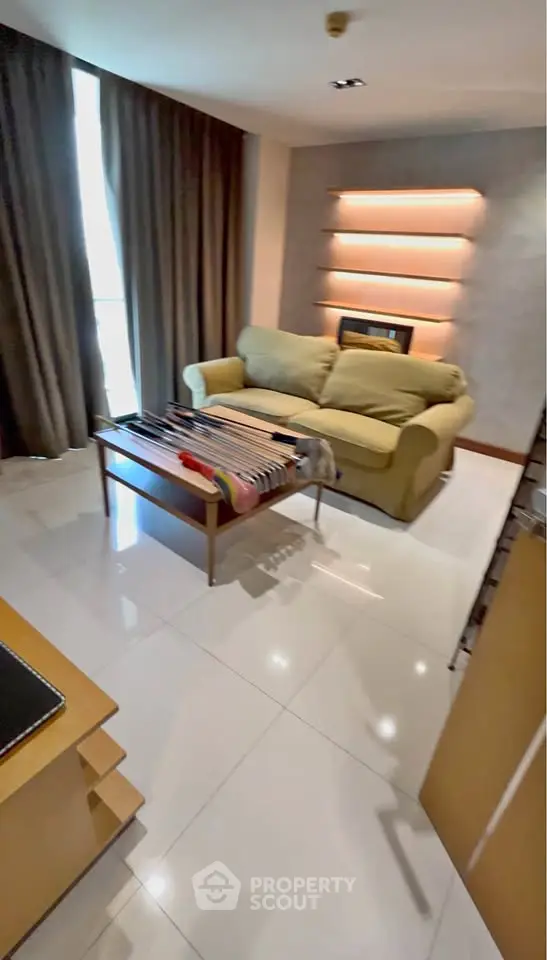 Modern living room with cozy sofa and stylish lighting