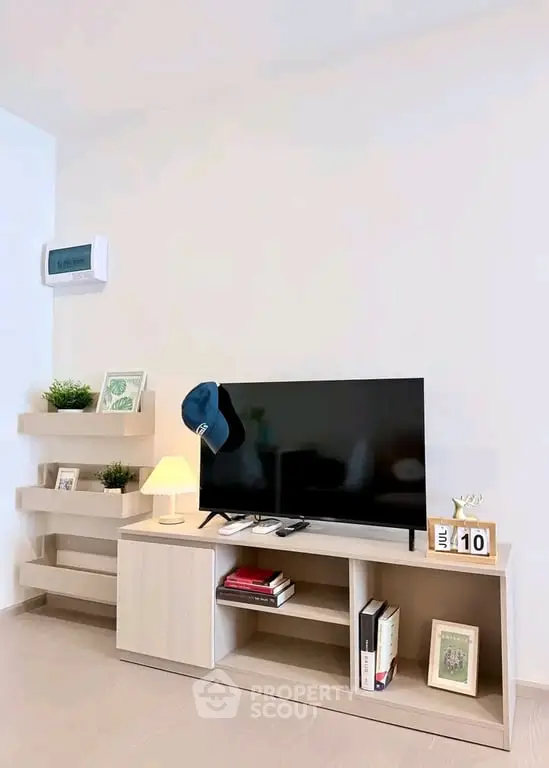 Modern living room with sleek TV stand and stylish decor