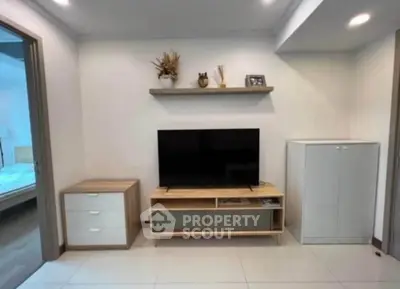 Modern living room with sleek TV setup and stylish decor