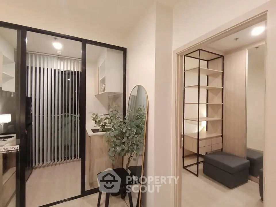 Modern apartment interior with sleek kitchen and cozy living area