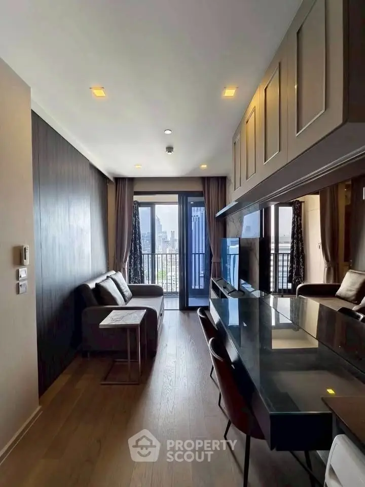 Modern living room with city view, featuring sleek furniture and stylish decor, perfect for urban living.