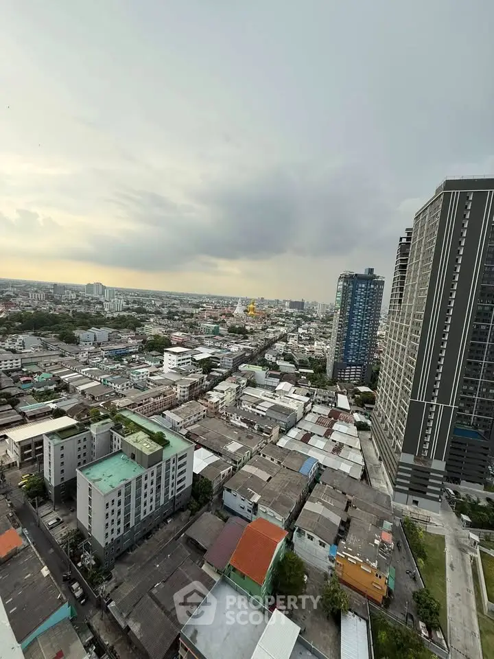 Stunning cityscape view from high-rise building showcasing urban skyline and architectural diversity.