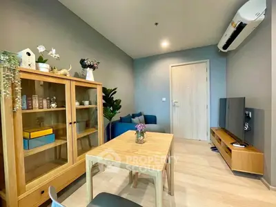 Modern living room with stylish furniture and air conditioning, perfect for cozy gatherings.