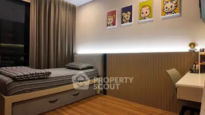 Stylish modern bedroom with sleek design and artistic wall decor