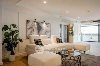 Luxurious modern living room with elegant decor and spacious layout.