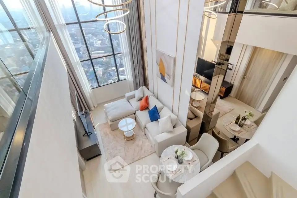 Luxurious modern living room with high ceilings and city view, featuring elegant decor and dining area.