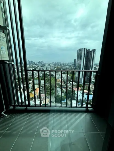 Stunning cityscape view from a high-rise balcony, perfect for urban living.