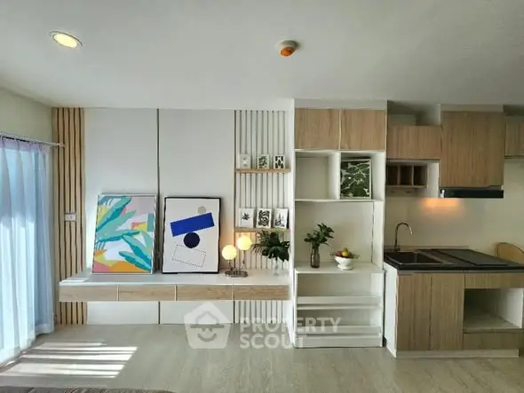 Modern living room with stylish decor and open kitchen layout