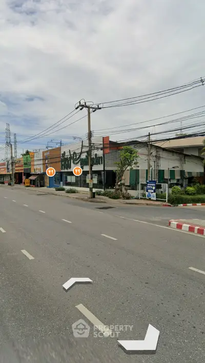 Street view of commercial buildings with potential for business opportunities