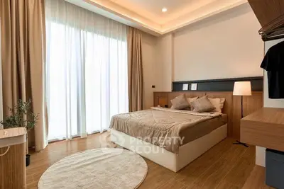 Modern bedroom with cozy decor and natural light
