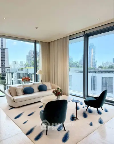 Luxurious modern living room with panoramic city views and elegant furnishings.
