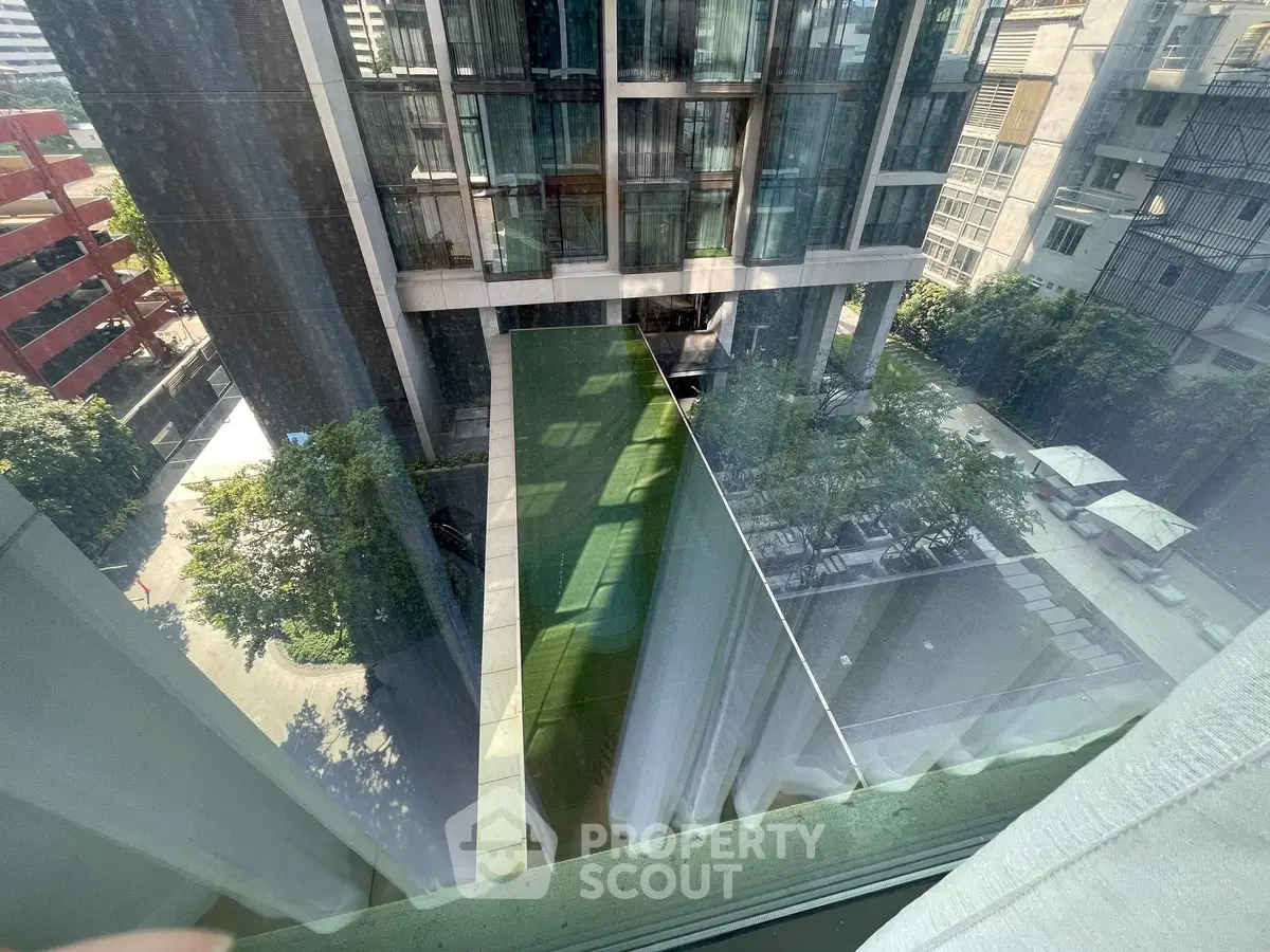 Stunning view from high-rise apartment overlooking modern urban landscape