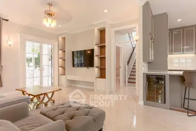 Elegant living room with modern decor and natural light