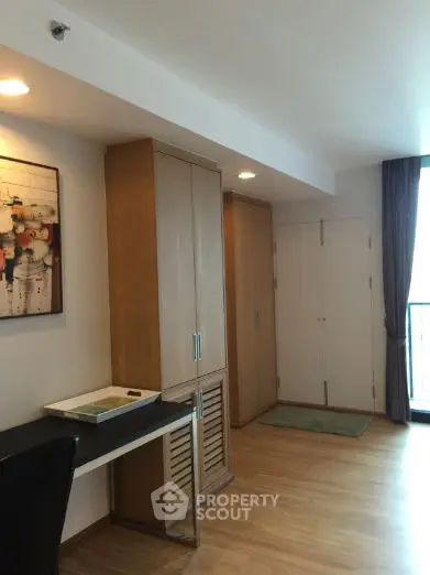 Modern interior with wooden flooring and stylish decor in a bright apartment
