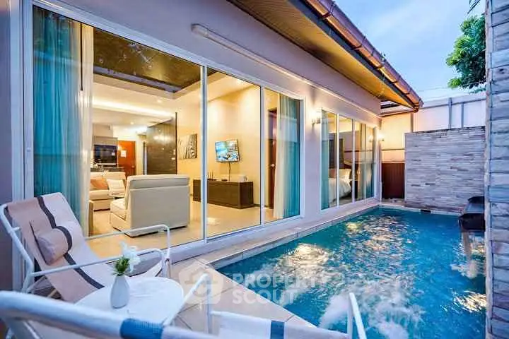 Luxurious modern home with private pool and elegant interior design.