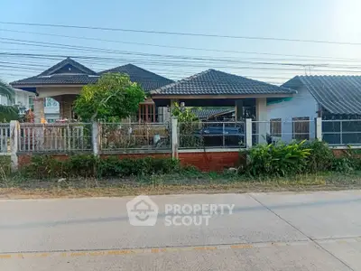 Charming single-story home with lush garden and spacious driveway in a serene neighborhood.