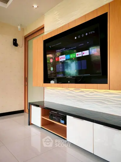 Modern living room with sleek TV unit and stylish decor