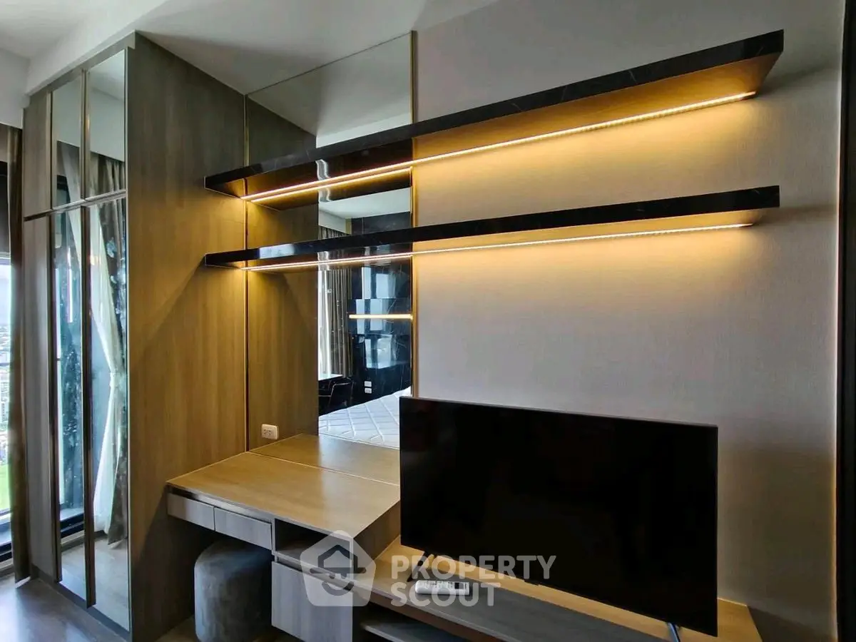 Modern living room with sleek TV unit and ambient lighting