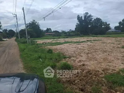 Spacious vacant land plot with potential for development in a serene rural setting.
