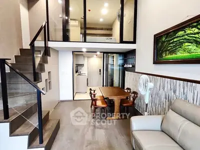 Modern loft apartment with stylish interior and open kitchen layout