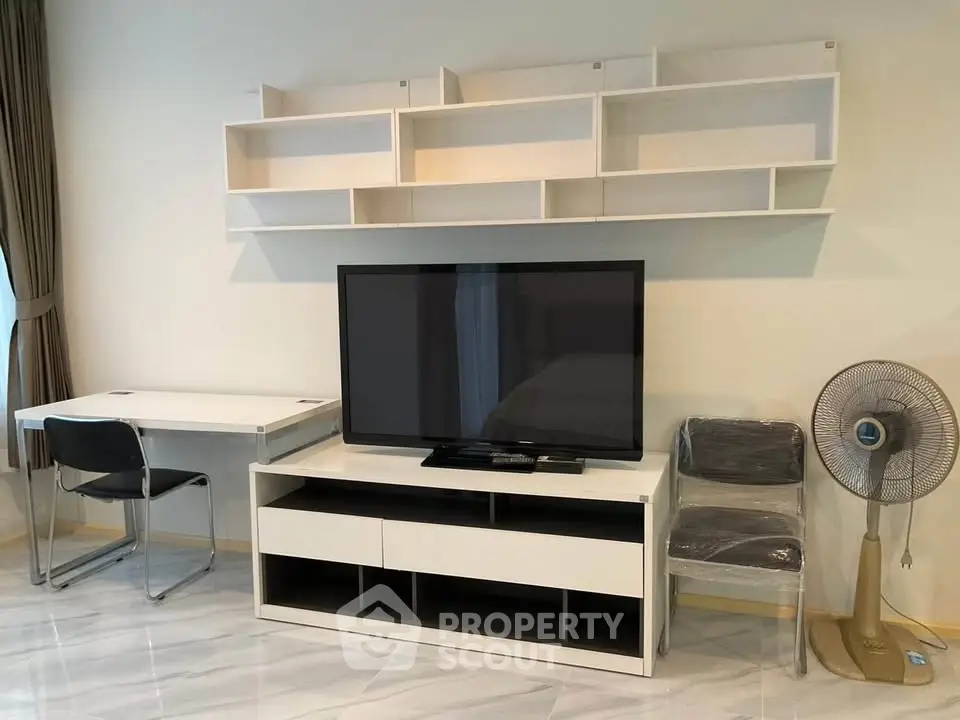Modern living room with sleek TV stand and minimalist decor