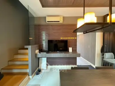 Modern living room with stylish wooden accents and sleek lighting