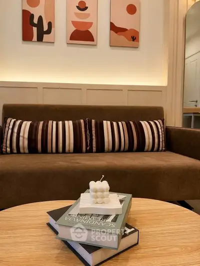Stylish living room with modern decor and cozy sofa, perfect for relaxation.