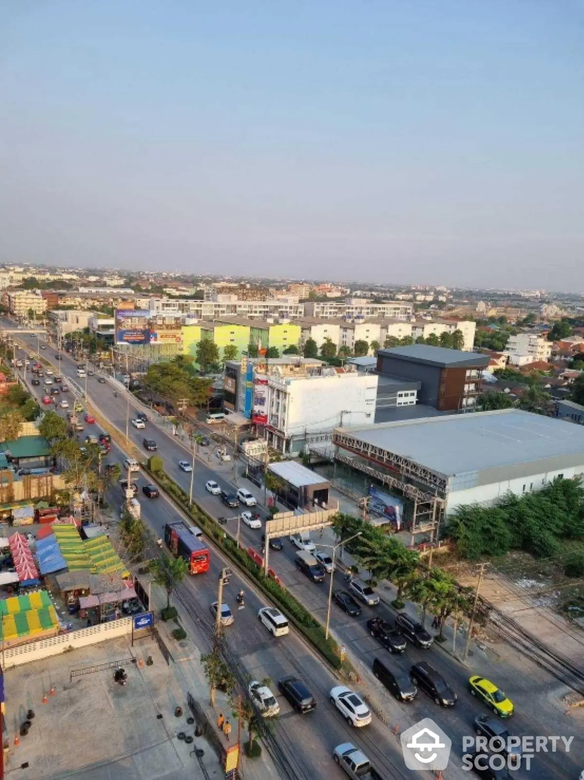 Stunning aerial view of bustling urban landscape with vibrant city life and modern architecture.