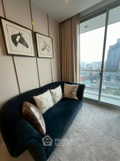 Modern living room with elegant sofa and city view from large window