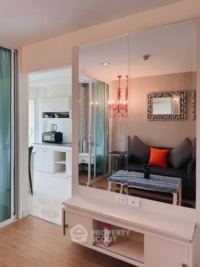 Modern living room with stylish decor and open kitchen layout