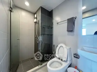 Modern bathroom with sleek design and glass shower enclosure