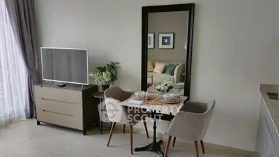 Modern living room with stylish dining area and sleek TV setup