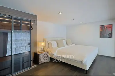 Luxurious modern bedroom with sleek design and elegant furnishings, perfect for relaxation and comfort.