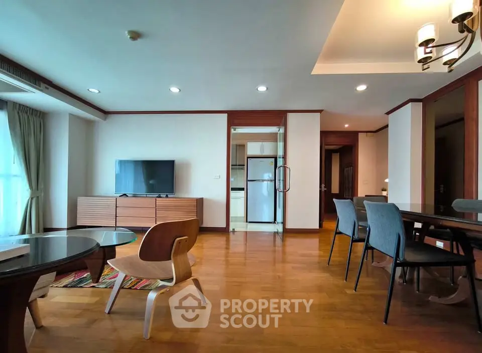 Spacious living room with modern furniture and open layout, perfect for entertaining.