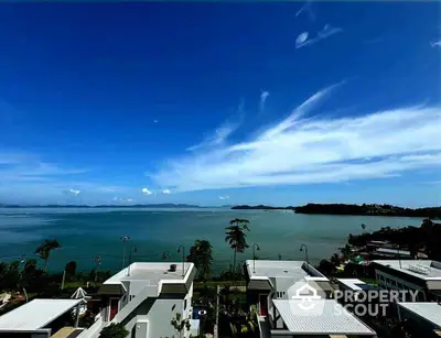 Stunning ocean view from modern coastal homes with clear blue skies