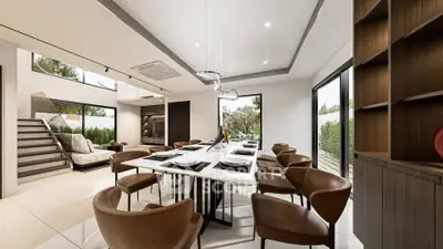 Luxurious modern dining room with elegant decor and large windows offering garden views.
