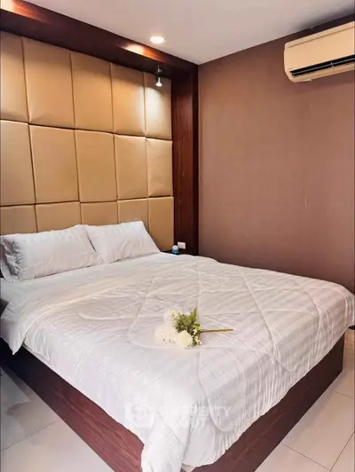 Luxurious bedroom with elegant design and cozy ambiance, featuring a stylish bed and modern decor.