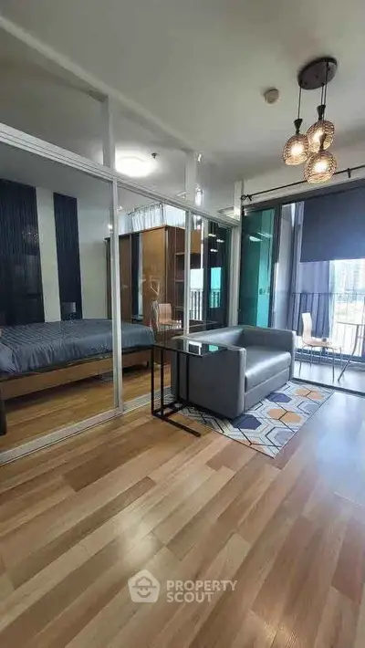 Modern living room with glass partition and stylish decor in urban apartment