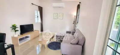 Modern living room with stylish furniture and natural light