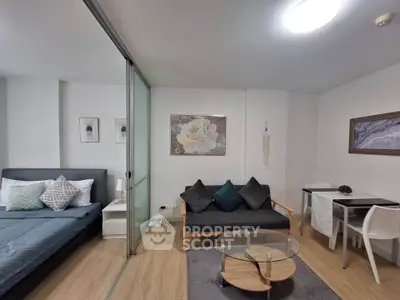 Modern studio apartment with stylish decor and glass partition